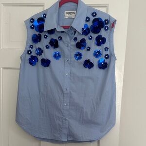 Essentiel Antwerp sleeveless blouse with rhinestone and floral detail.